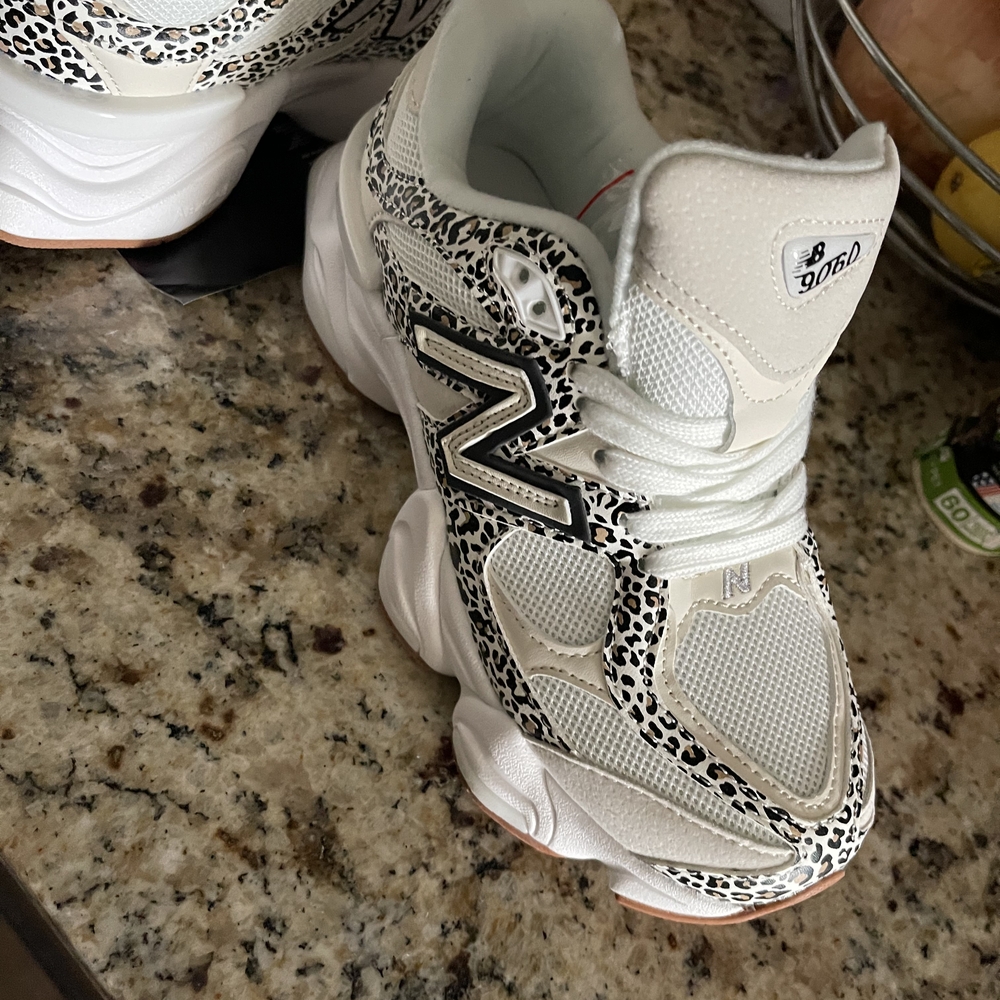 New Balance White and Black Sneakers